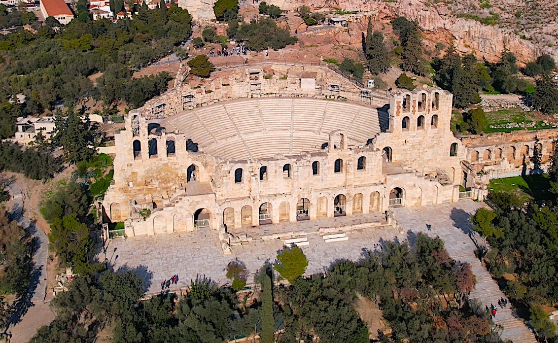 The Odeon of Herodes Atticus, an ancient stone theater located on the southwest slope of the Acropolis in Athens, Greece.