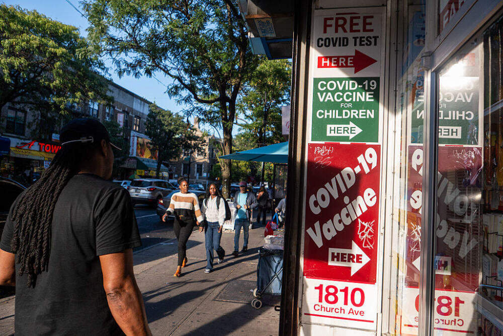 A pharmacy advertises COVID -19 testing and a vaccine on September 04, 2025 in the Brooklyn borough of New York City. (Spencer Platt/Getty Images)