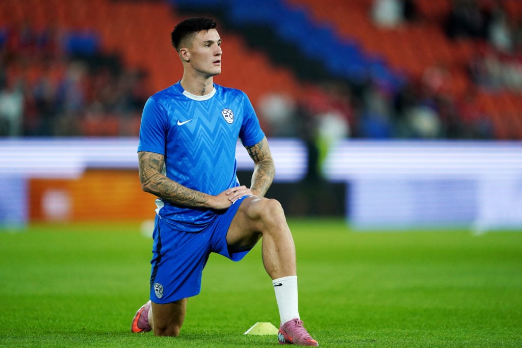 Benjamin Sesko warming up to face Switzerland