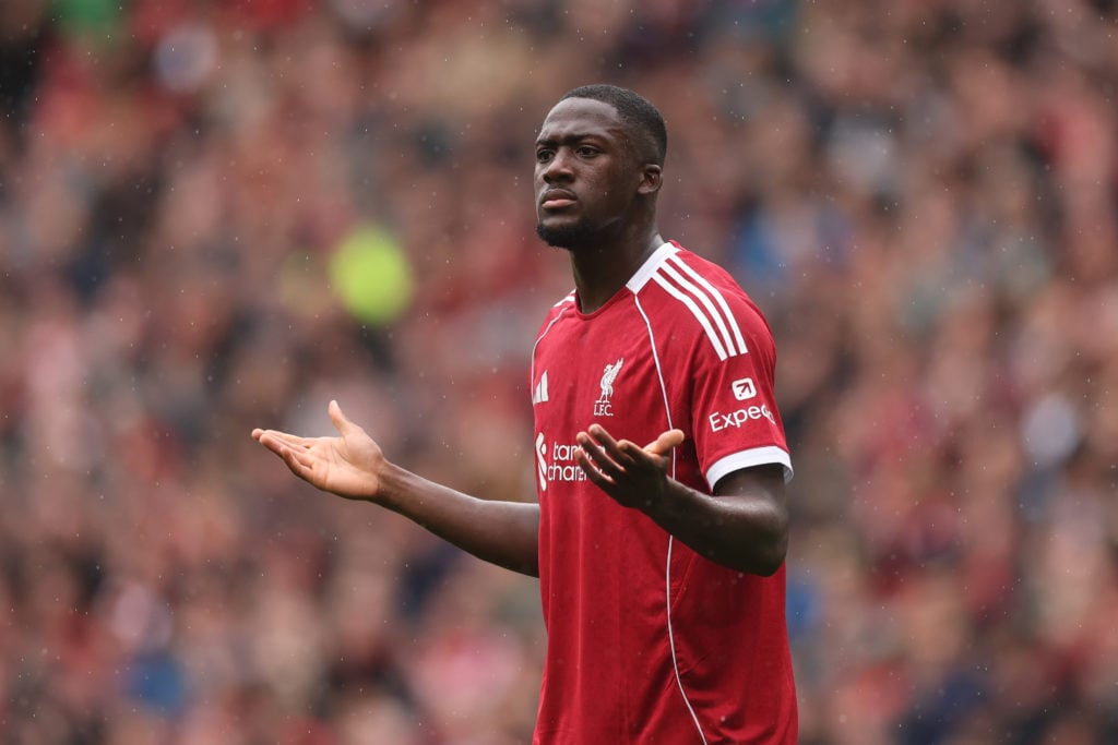 Ibrahima Konate lifts his hands during Everton game