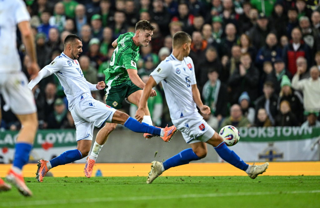 Justin Devenny of Northern Ireland shoots at goal.