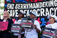Opponents rally before a Texas House redistricting committee public hearing Monday at the...