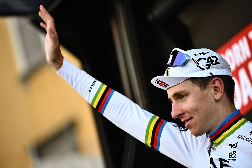 UAE Team Emirates&rsquo;s Slovenian rider Tadej Pogacar celebrates his victory on the podium after the 119th edition of the Giro di Lombardia (Tour of Lombardy), a 238km cycling race from Como to Bergamo on October 11, 2025. (Photo by Marco BERTORELLO / AFP)