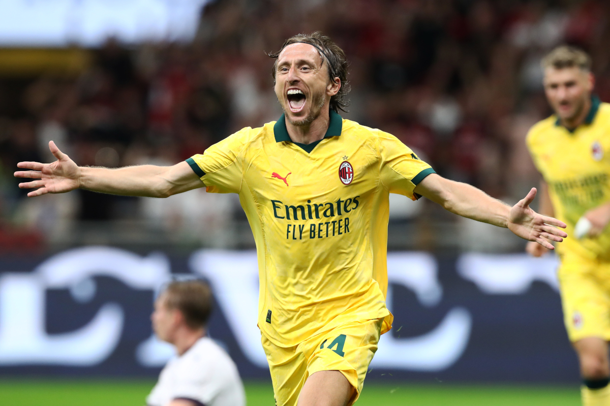 MILAN, ITALY - SEPTEMBER 14: Luka Modric of AC Milan celebrates scoring his team's first goal during the Serie A match between AC Milan and Bologna FC 1909 at Giuseppe Meazza Stadium on September 14, 2025 in Milan, Italy. (Photo by Marco Luzzani/Getty Images)