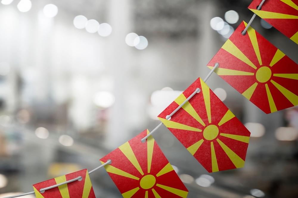 North Macedonia flags - © BUTENKOV ALEKSEI/Shutterstock