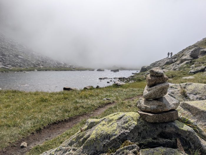 The landscape disappears into the clouds