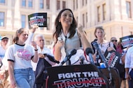State Rep. Gina Hinojosa speaks during a rally to protest against redistricting hearings at...