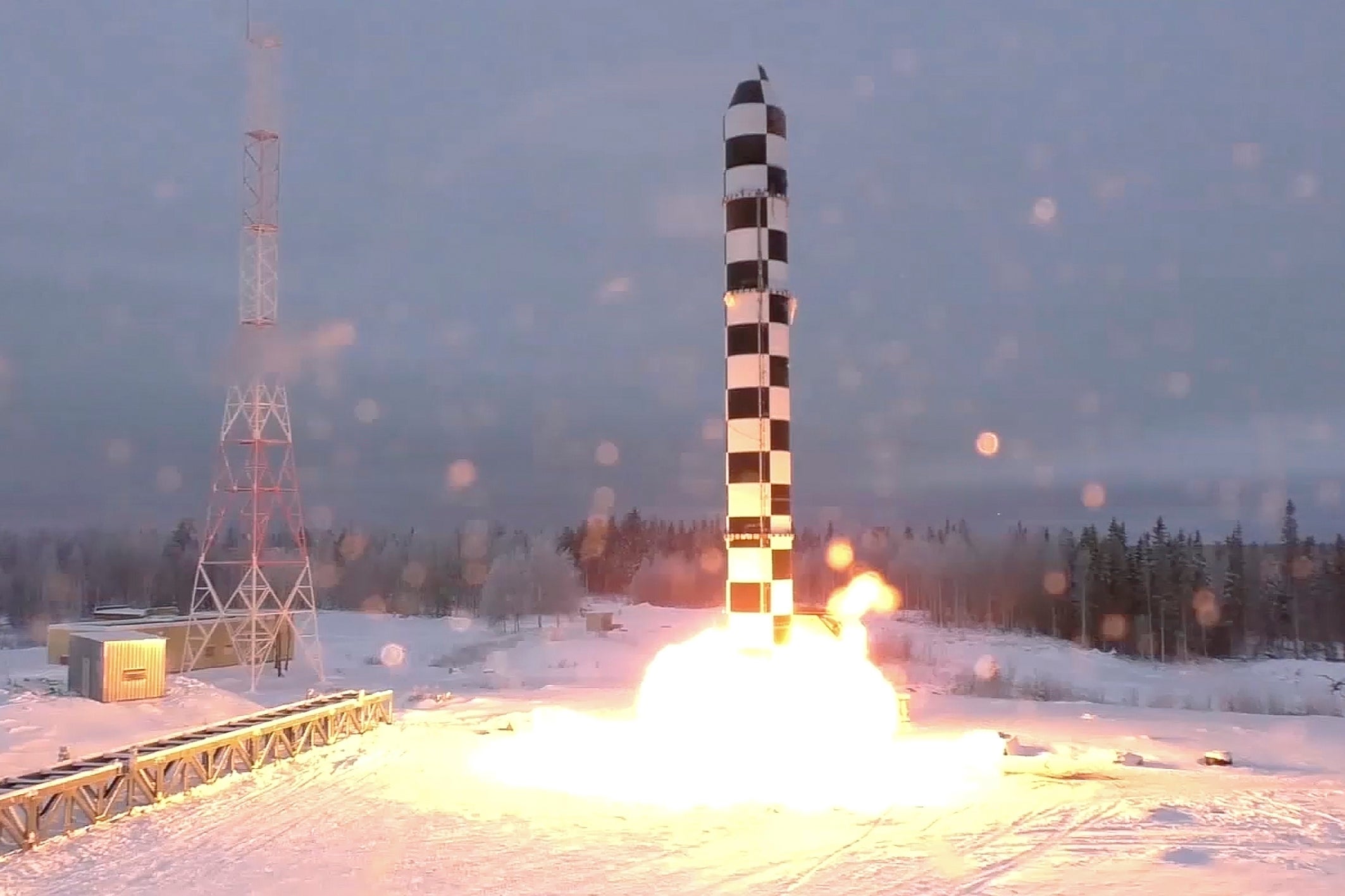 FILE - In this video grab provided by RU-RTR Russian television via AP television on Thursday, March 1, 2018, Russia's new Sarmat intercontinental ballistic missile blasts off during a test launch from an undisclosed location in Russia