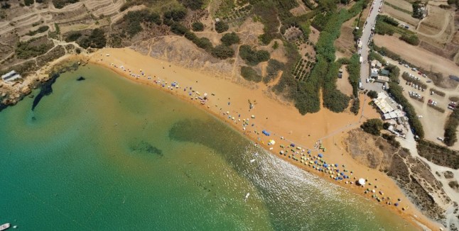 A British man is missing and an 11-year-old boy has died after the pair got into difficulty while swimming off a beach in Malta.