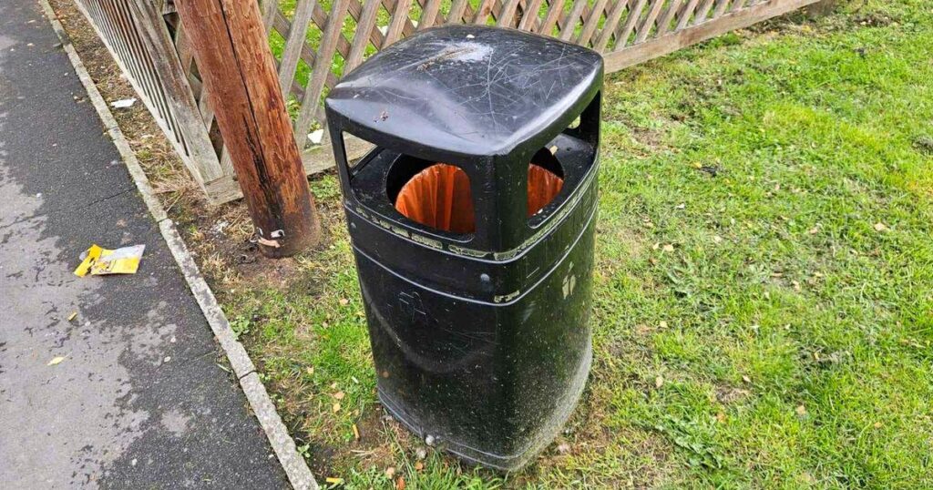 Mum who put envelope in public waste bin to be 'interviewed under caution by crime officers'