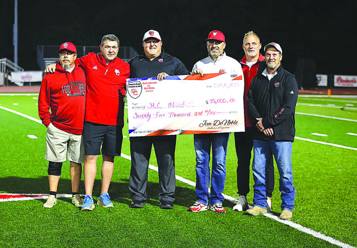 Saint’s Club presents check to St. C. schools | News, Sports, Jobs