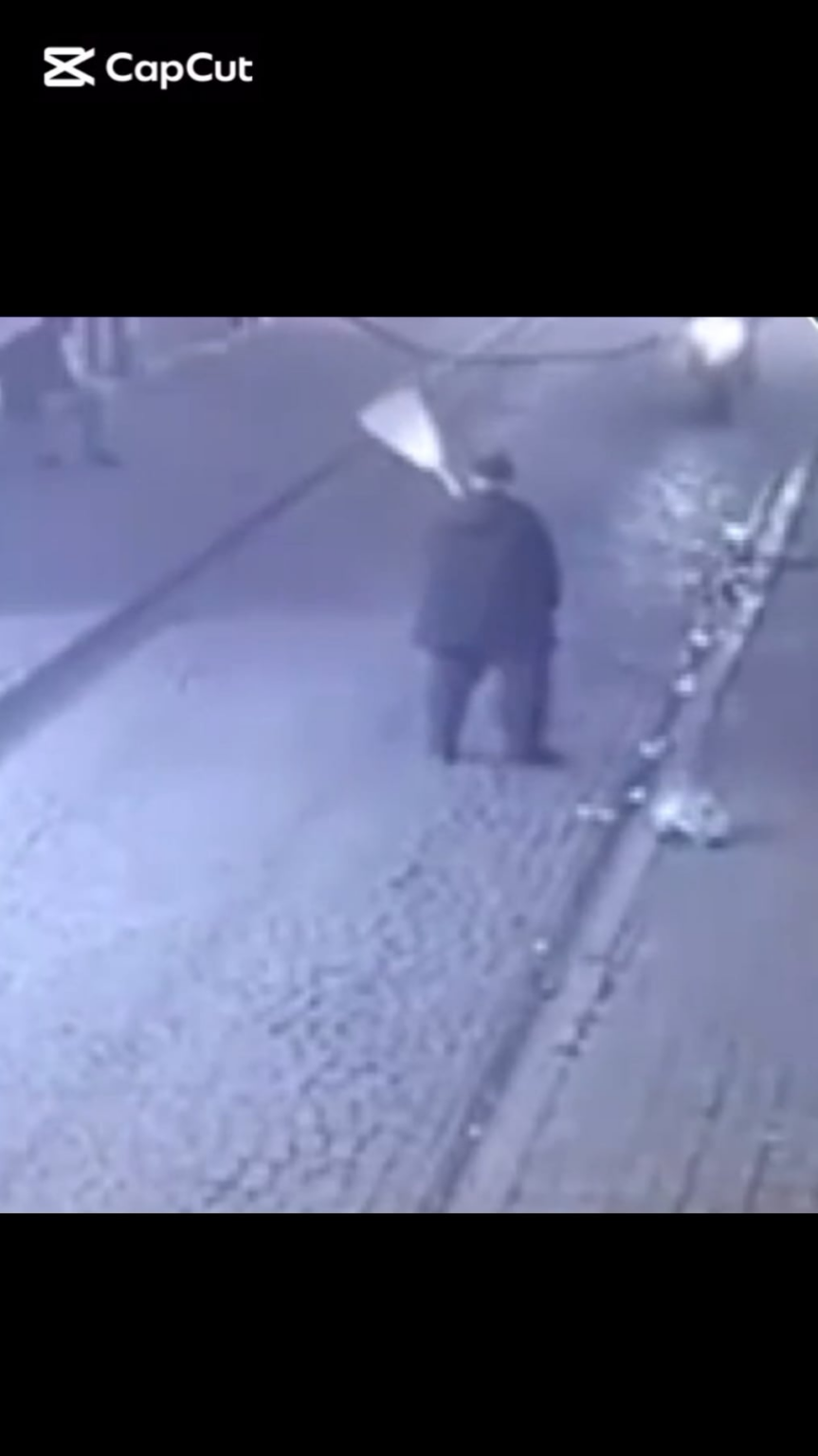 Uncle hitting a motorcycle with a broom