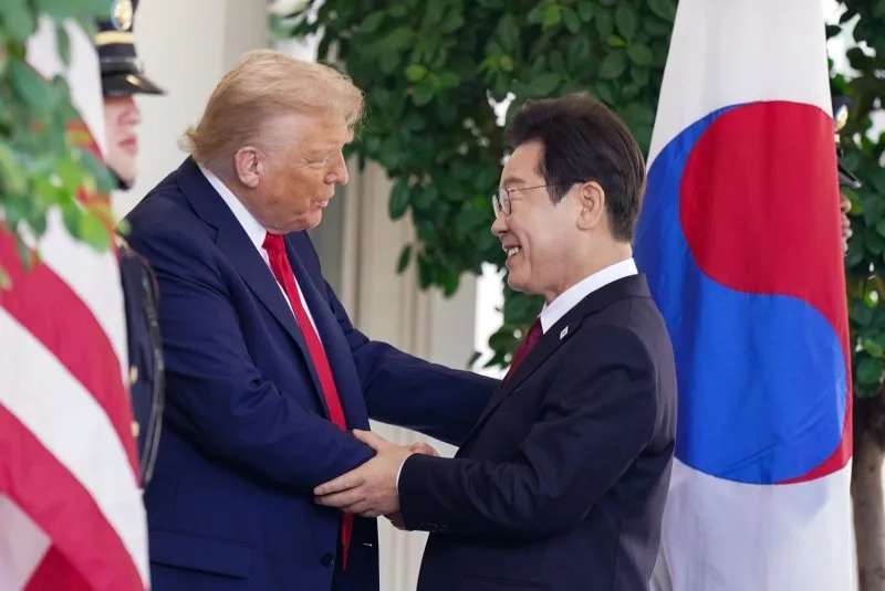 President Donald Trump greets South Korean President Lee Jae Myung outside the West Wing of the White House in Washington, D.C., in August. This past month he said the raid that was carried out by U.S. Immigration and Customs Enforcement officers could jeopardize future South Korean investments in the United States. File Photo by Al Drago/UPI