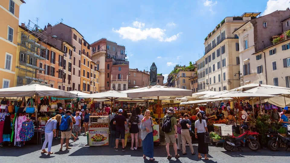 ROME - JULY 02: market with unidentified people on the Campo de Fiori on July 02, 2014 in Rome.1869 the flower market of the famous Piazza Navona was relocated to the Campo de Fiori