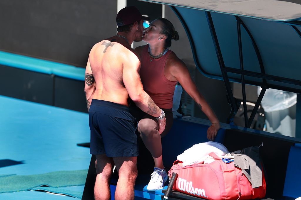 Aryna Sabalenka and Georgios Frangulis seen during a practice session ahead of the 2025 Australian Open