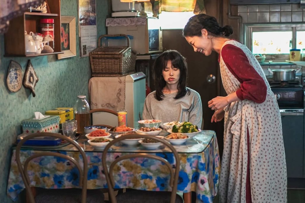 IU (left) and Moon So-ri in a still from period K-drama series “When Life Gives You Tangerines”. Photo: Netflix