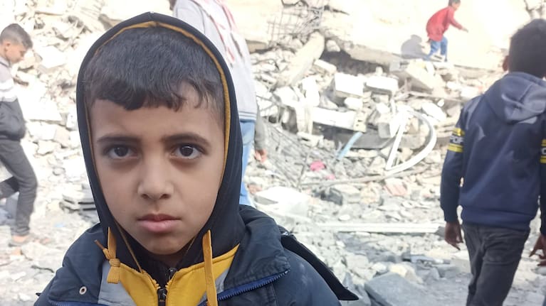 Musa Abusaileek, 8, on the rubble-strewn streets of Khan Younis during the ceasefire earlier this year.