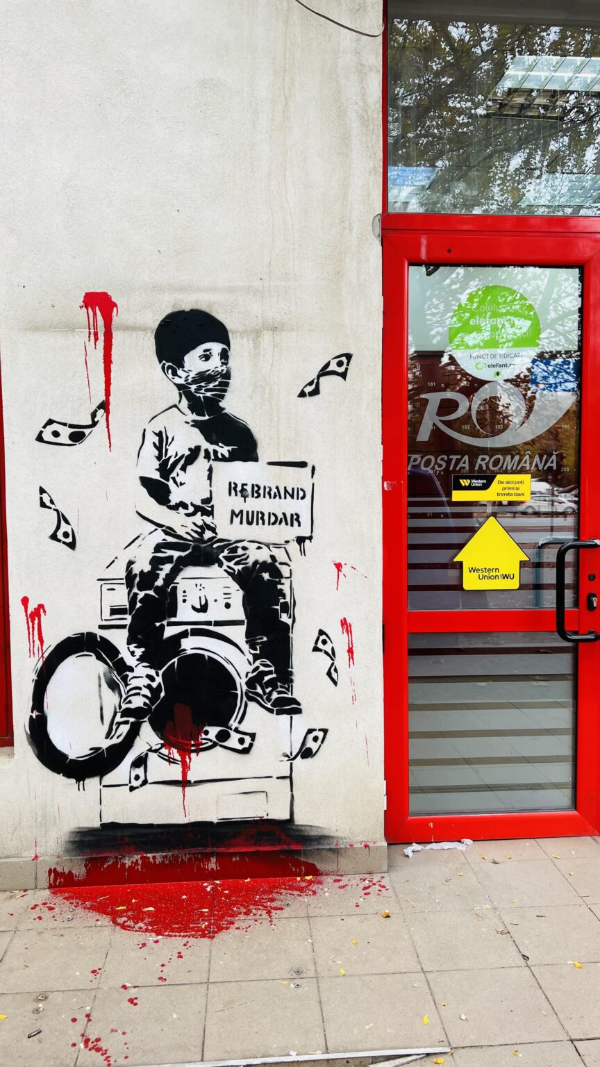 Stencil appeared at the entrance of a post office.