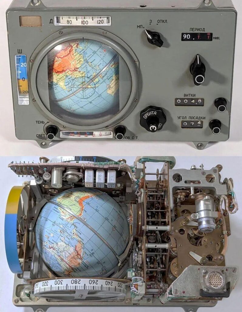 Globus INK, a Soviet era mechanical spaceflight navigation system from the 1960s. It featured a rotating, 5" globe to display the spacecraft's real-time position relative to Earth and calculated orbital parameters using an intricate system of gears, cams, and differentials. Photo by Ken Shirriff