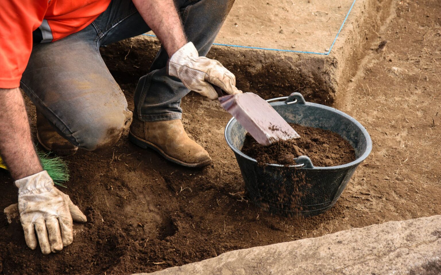 Manual Labor On An Active Archaeological Dig.