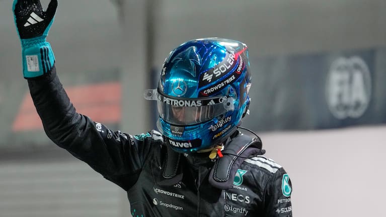 Mercedes driver George Russell of Britaine reacts after taking pole position during the qualifying for the Singapore Formula One Grand Prix at the Marina Bay Street Circuit in Singapore, Saturday, Oct. 4, 2025.