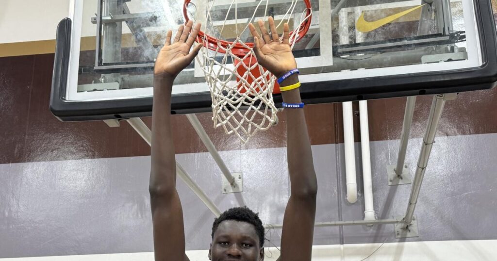 Coach Todd Wolfson welcomes 7-foot-3 Cherif Millogo to St. Francis