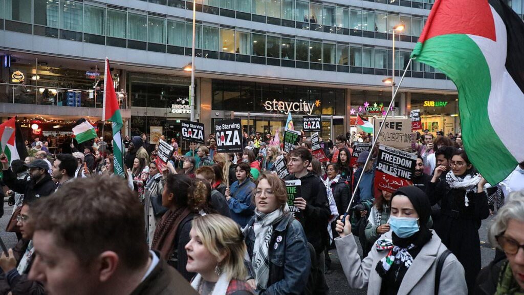 Pro-Palestine protestors blasted as 'disgusting' as they march in Manchester - just miles from synagogue where two innocent people were killed in terror attack