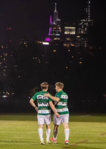 Players from Lansdowne Yonkers FC in front of the New York City skyline. Credit: Lansdowne Yonkers FC