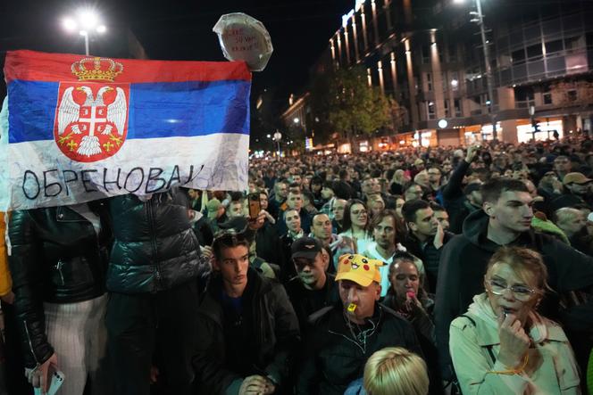 Opponents of Serbian President Aleksandar Vucic demonstrate in front of the Parliament in Belgrade on November 5, 2025.