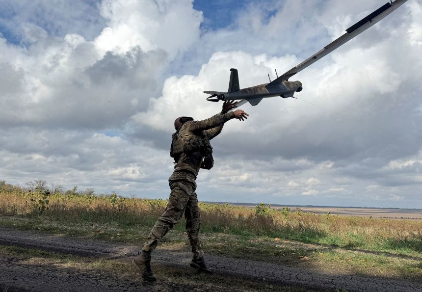 A Ukrainian serviceman launches a reconnaissance drone near Pokrovsk on October 6, 2025.