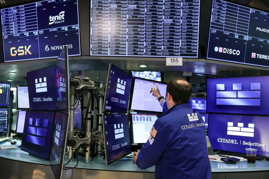 A Trader works on the floor of the New York Stock Exchange on Friday.