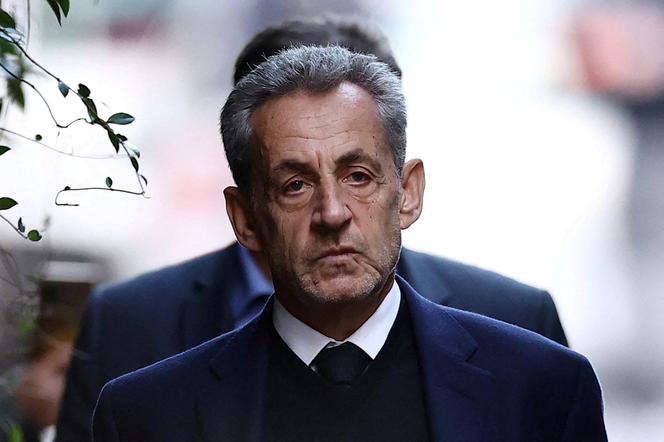 Former French president Nicolas Sarkozy leaves his house on the day of his incarceration at the Sante prison to begin his five-year prison sentence for criminal conspiracy over attempts to raise campaign funds from Libya, in Paris, France, October 21, 2025.