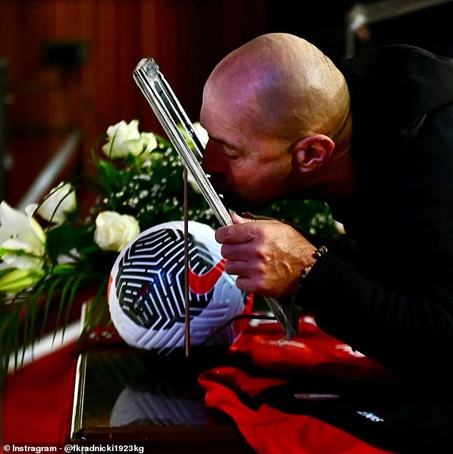 One attendee was seen kissing a photo of Zizovic which had been displayed in his honour