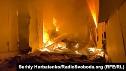 A central market in the Ukrainian city of Kramatorsk burns following a Russian air strike on November 29.