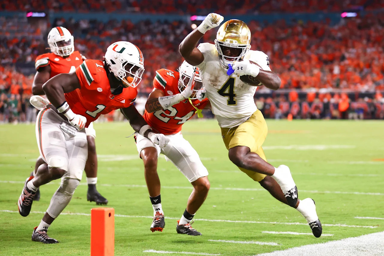 MIAMI GARDENS, FLORIDA - AUGUST 31: Jeremiyah Love #4 of the Notre Dame Fighting Irish carries the ball against the Miami Hurricanes during the third quarter of the game at Hard Rock Stadium on August 31, 2025 in Miami Gardens, Florida. (Photo by Megan Briggs/Getty Images)