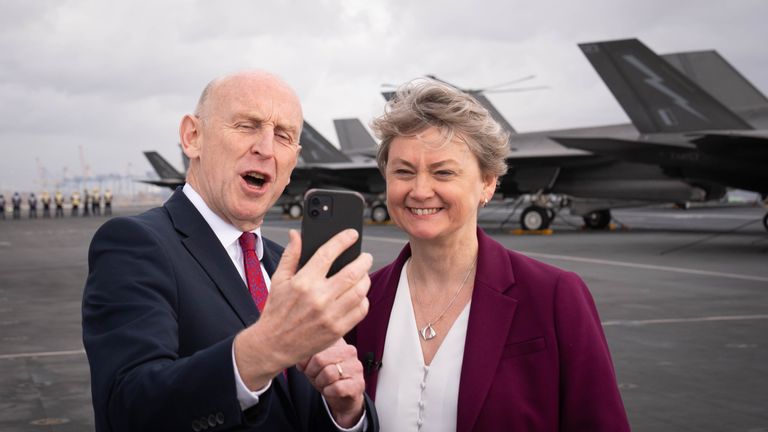 John Healey and Yvette Cooper during a visit to HMS Prince of Wales. Pic: PA