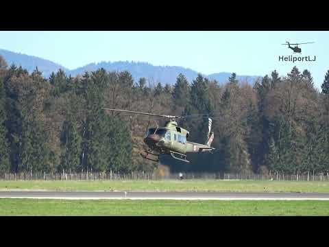 A training Bell 412 takes off after Lufthansa's CRJ 900 lands