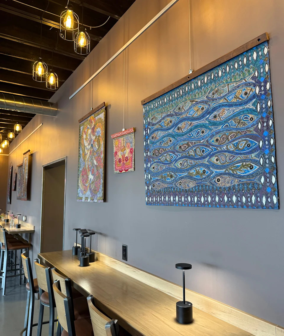 Local artwork is displayed at The Delaware, a restaurant and live music venue in Tuscarawas County.