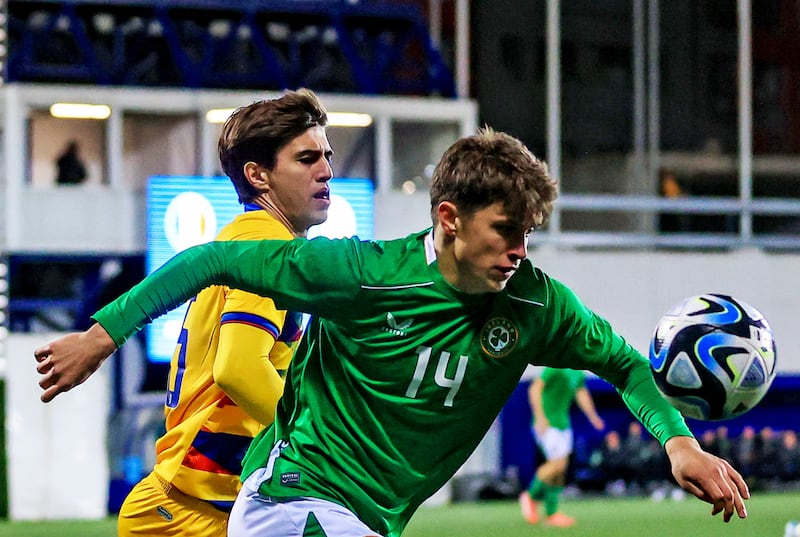 Ireland's Conor McManus is challenged by Andorra's Guillem Acosta. Photograph: Aleksandar Djorovic/Inpho