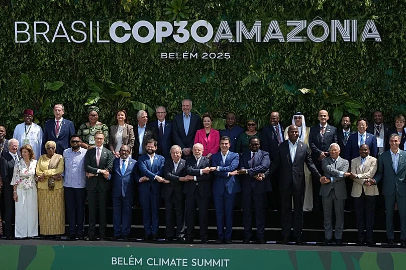Leaders attending the COP30 UN Climate Summit pose for a group photo in Belém, 7 November, 2025