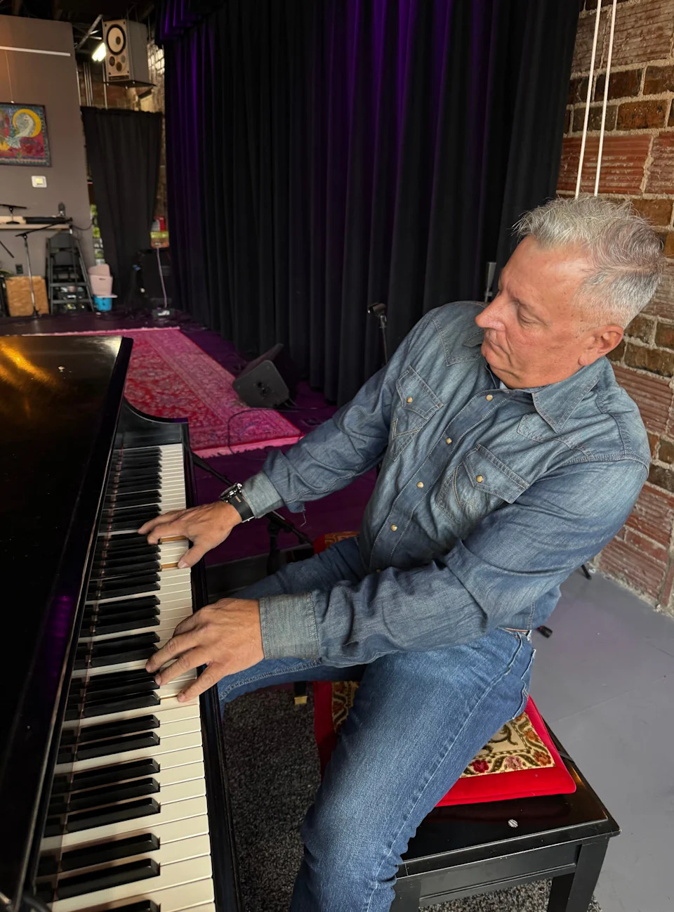 Don Whittingham plays a 1960 Baldwin grand piano at The Delaware in downtown New Philadelphia, a live music venue that features both ticketed and free concerts and a diverse mix of genres.