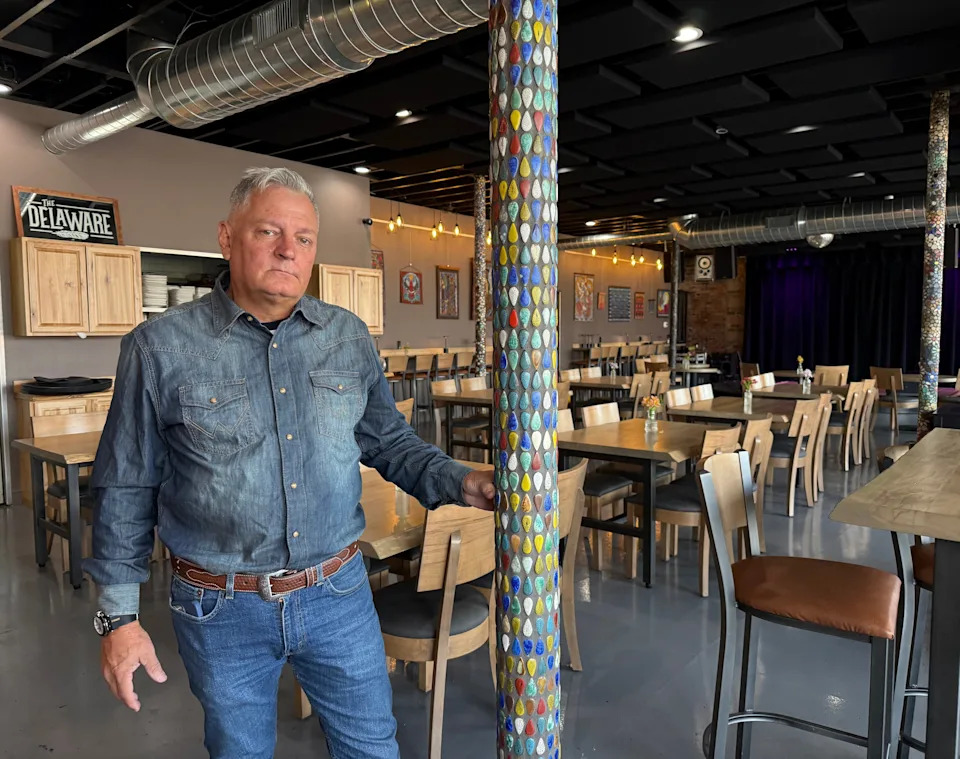 Decor of The Delaware in downtown New Philadelphia includes mosaic poles, a kayak and artwork. The venue features both ticketed live music and free shows.