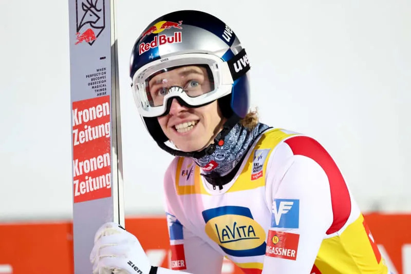 Austria's winner Daniel Tschofenig celebrates after winning the men's season opener event of the FIS Ski Jumping World Cup in Lillehammer. Geir Olsen/NTB/dpa