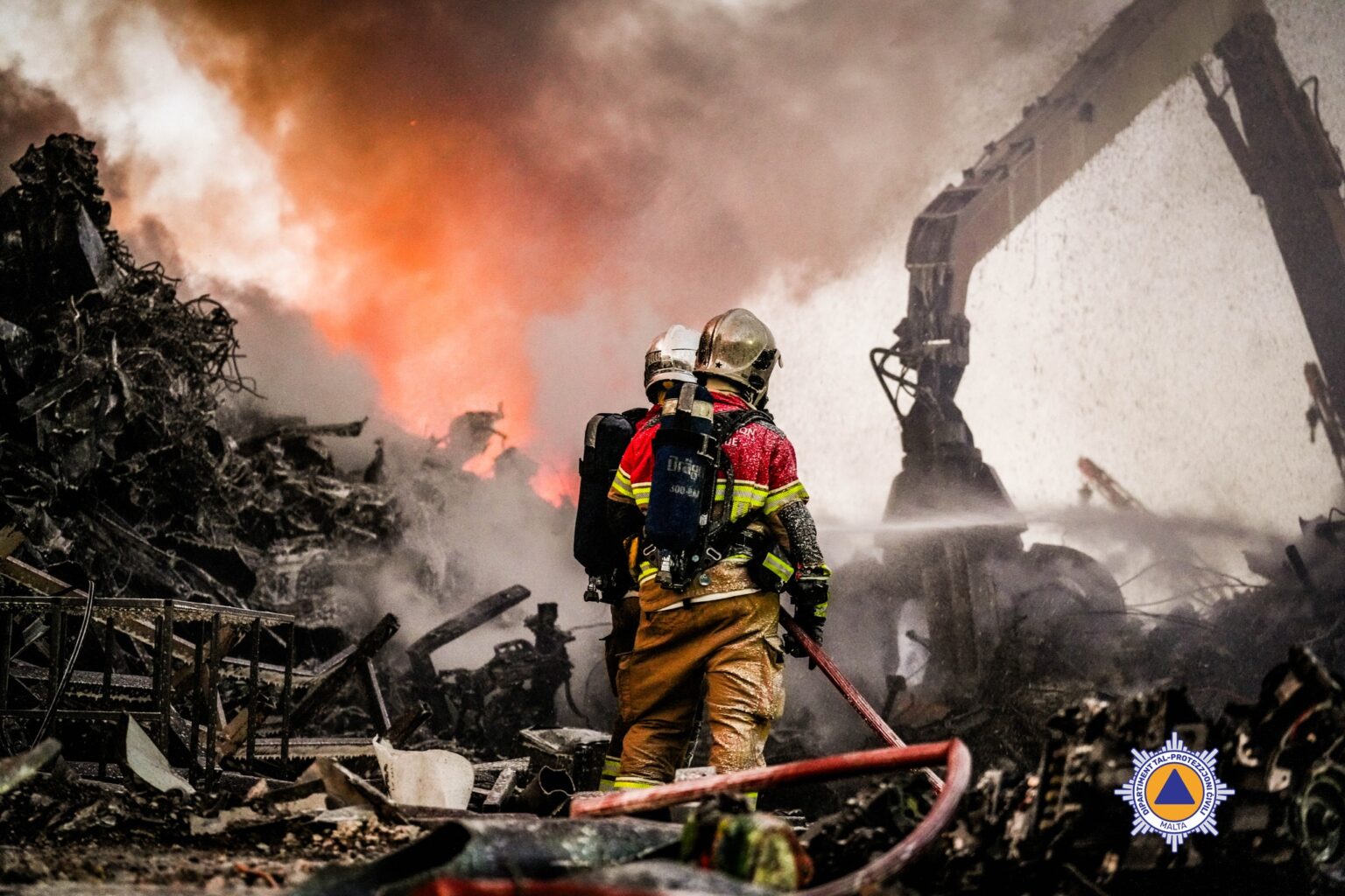Fire at Għaxaq scrapyard brought under control as emergency operations continue