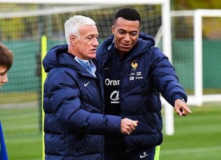 Kylian MBAPPE of France talks with Didier DESCHAMPS manager of France during the training session of France team at INF Clairefontaine on October 8, 2025 in Clairefontaine, Paris, France. (Photo by Ewen Gavet/Icon Sport via Getty Images)