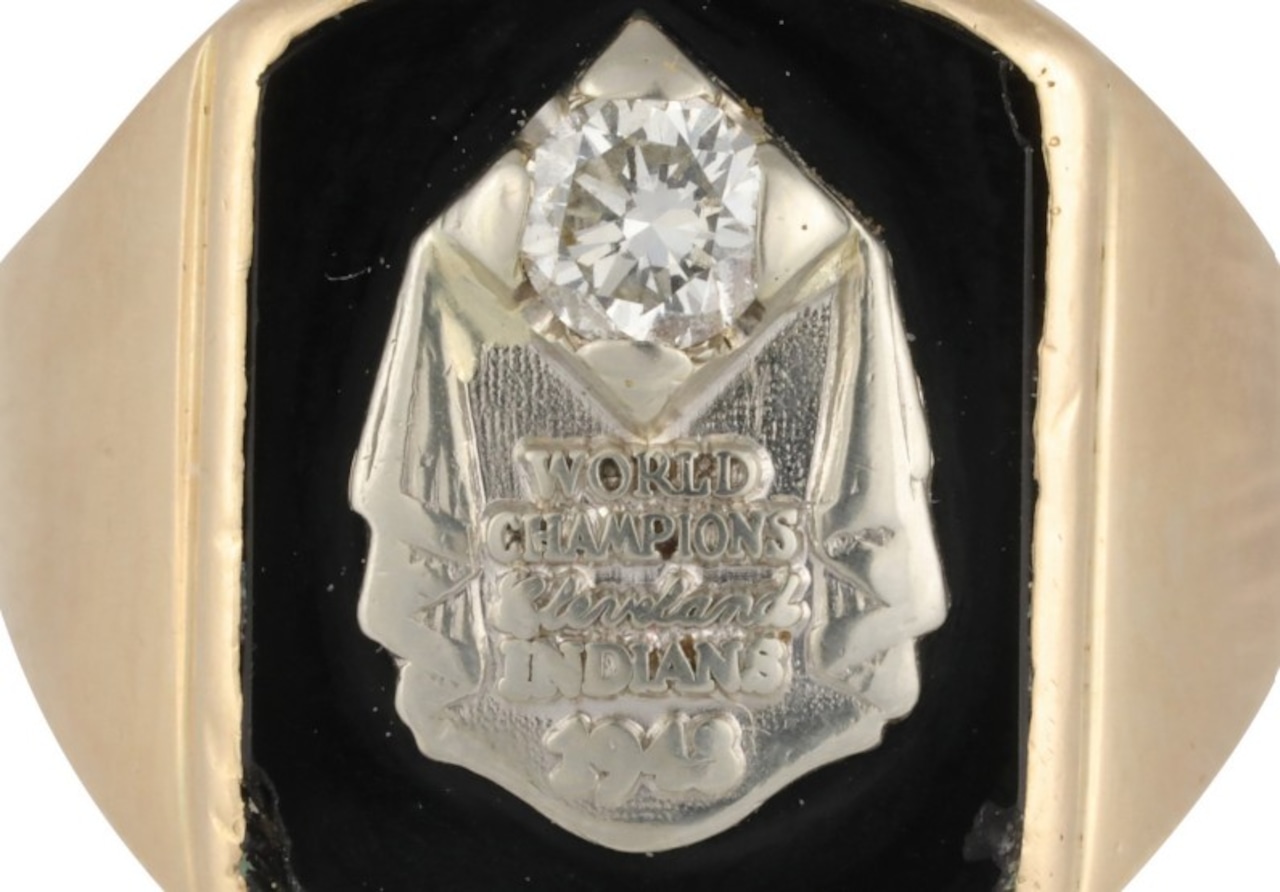 Bidding is open for several Cleveland sports items including three 2016 World Series balls.