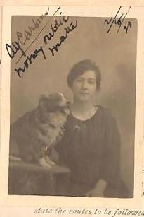 Winnie Camilleri and her pet posing for a travel portrait in 1920. The National Archives of Malta.