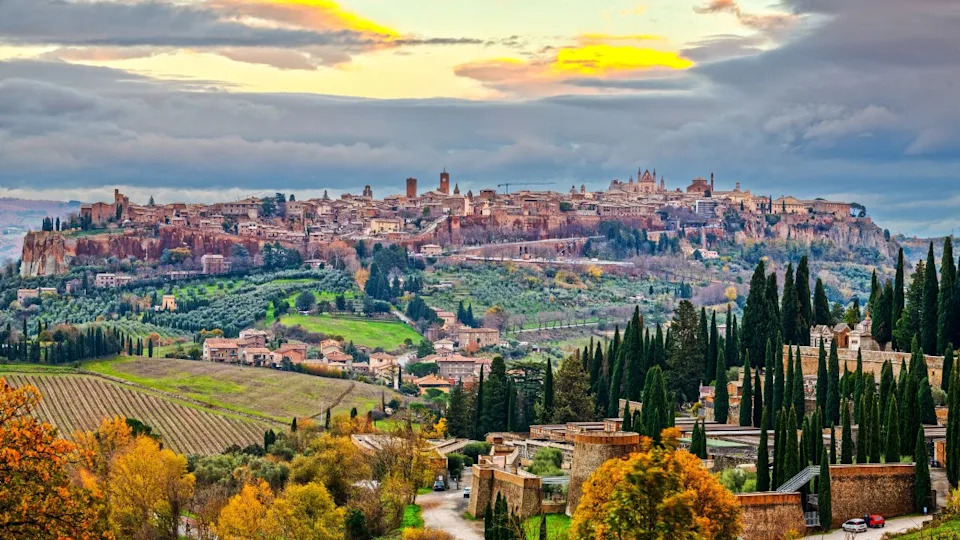 Orvieto, Umbria, Italy medieval skyline at dusk in autumn.