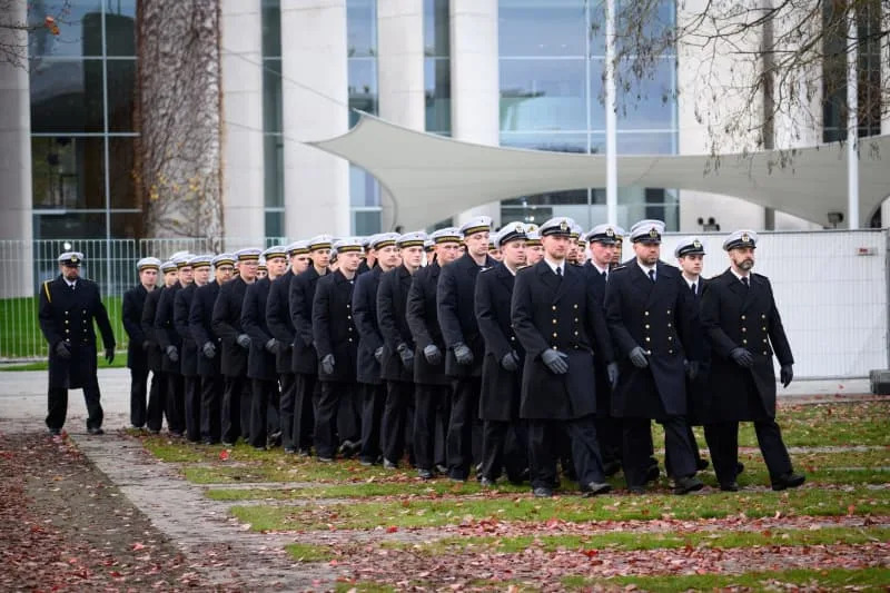 Bundeswehr recruits march between the German Bundestag and the Federal Chancellery during the ceremonial pledge as a central event to mark the 70th anniversary of the German Armed Forces (Bundeswehr) at the Bundesforum. On 12 November 1955, the then Minister of Defense, Blank, presented the first 101 volunteers with their certificates of appointment to mark the founding of the Bundeswehr. Bernd von Jutrczenka/dpa
