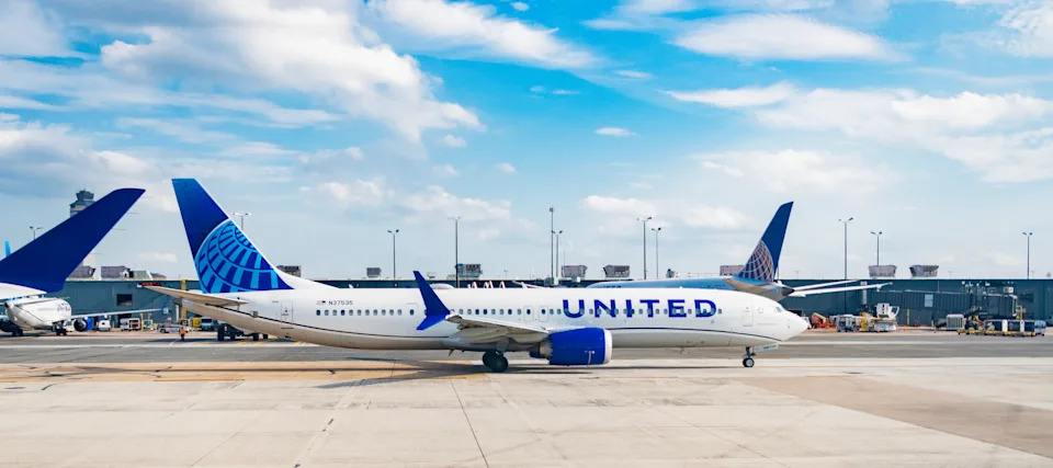 Washington, D.C., USA - June 30, 2024: United airline plane departure in airport. Airport terminal. Plane arrival of United airline. Departure and arrival at airport. Airplane terminal area.